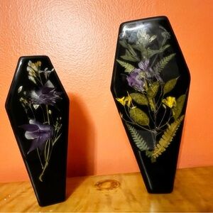 Pressed flower coffins sealed with resin